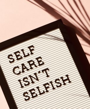 Self care isn t selfish signage